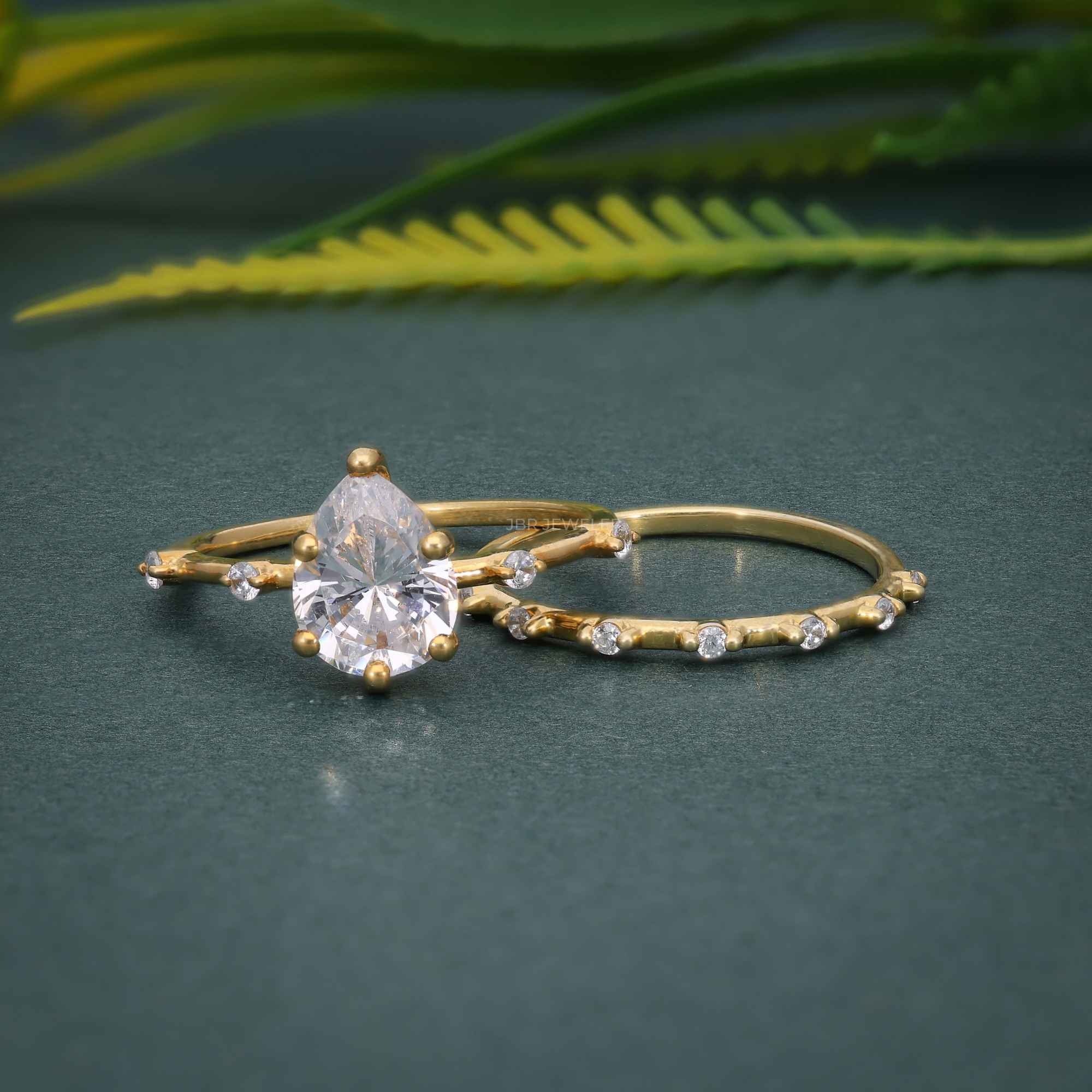 Pear Cut Moissanite Engagement Ring With Matching Bridal Ring Set