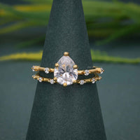 Pear Cut Moissanite Engagement Ring With Matching Bridal Ring Set