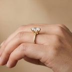 Six prong setting detail on pear cut diamond ring
