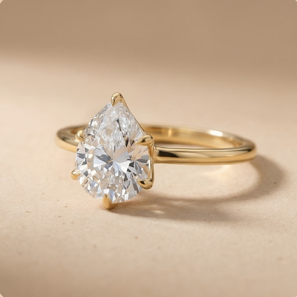 Six prong pear cut engagement ring side profile