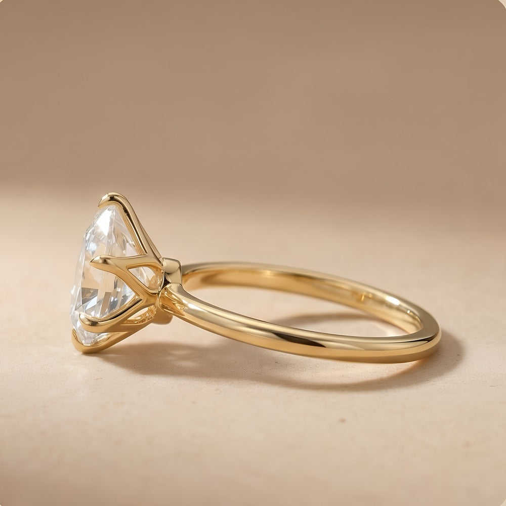 Six prong pear cut engagement ring side profile
