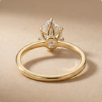 Six prong pear lab grown diamond ring top angle view