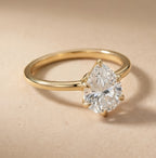 Six prong pear cut engagement ring side profile