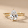 Six prong pear cut lab grown diamond engagement ring front view