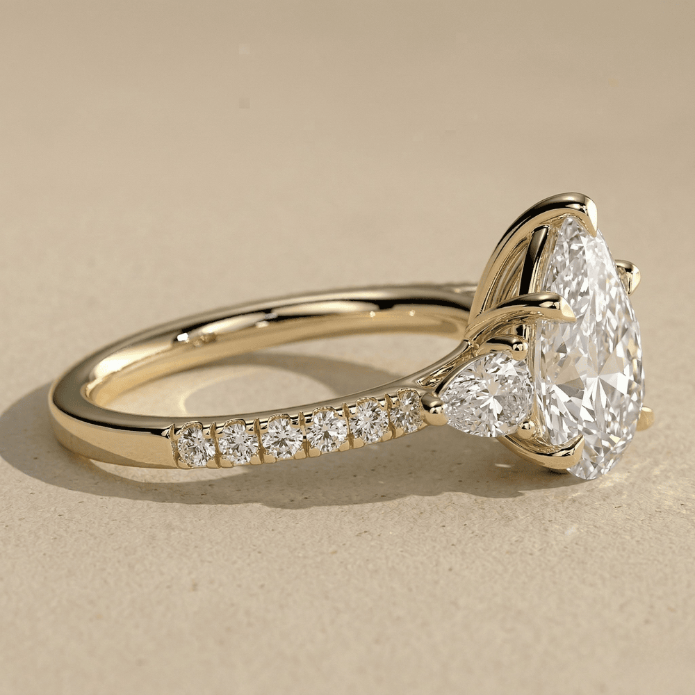 Pear shaped lab diamond cathedral bridal engagement ring