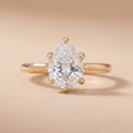 Pear lab grown diamond cathedral ring with hidden halo