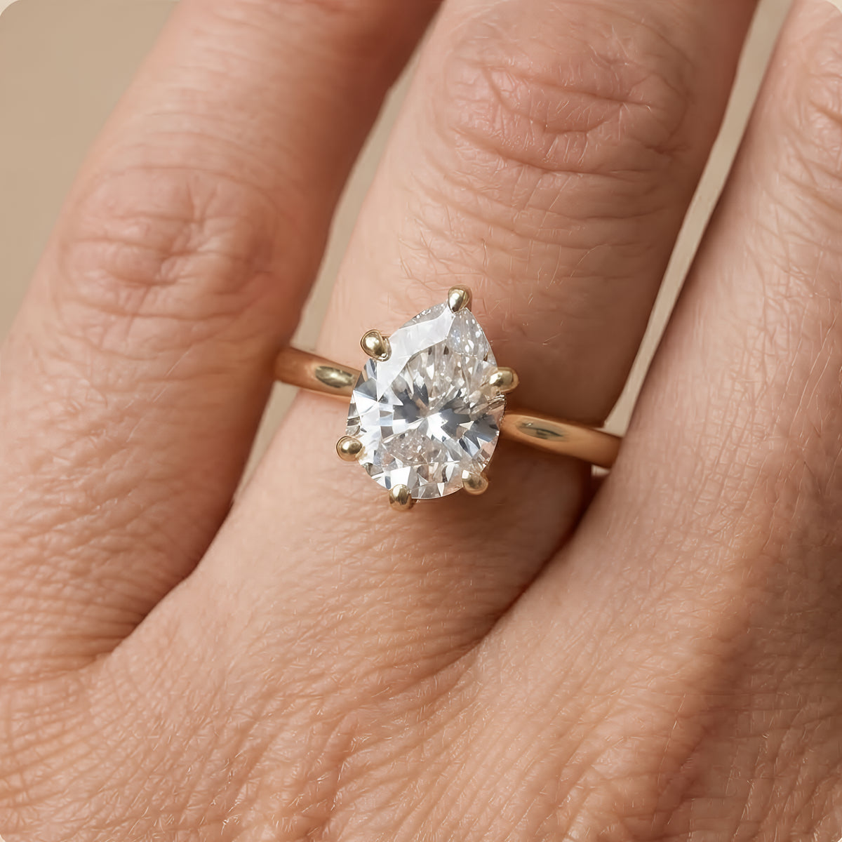 Pear cathedral hidden halo ring in white gold band