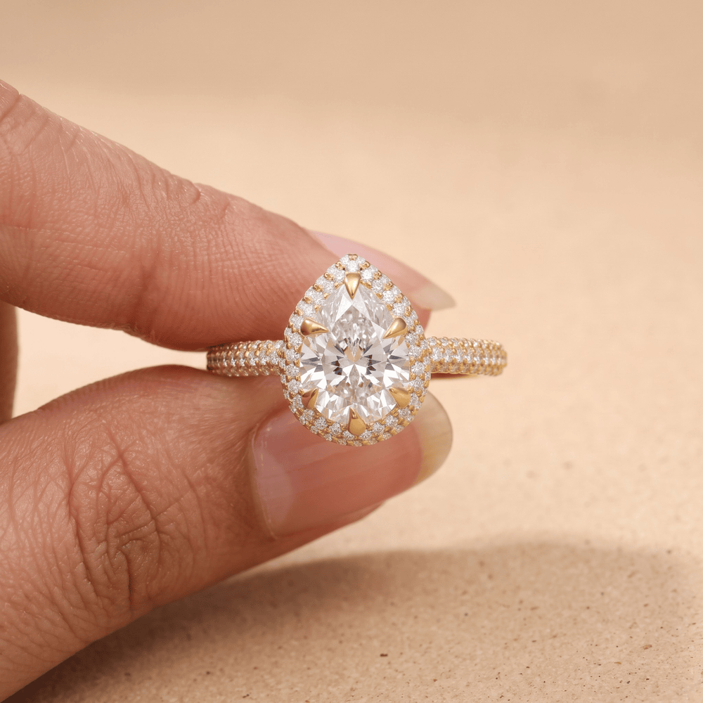 14K pear halo promise ring angled profile shot
