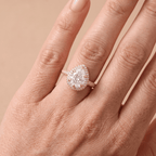 Pear shaped promise ring on model's finger