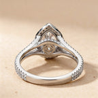 Hidden halo pear moissanite engagement ring top view