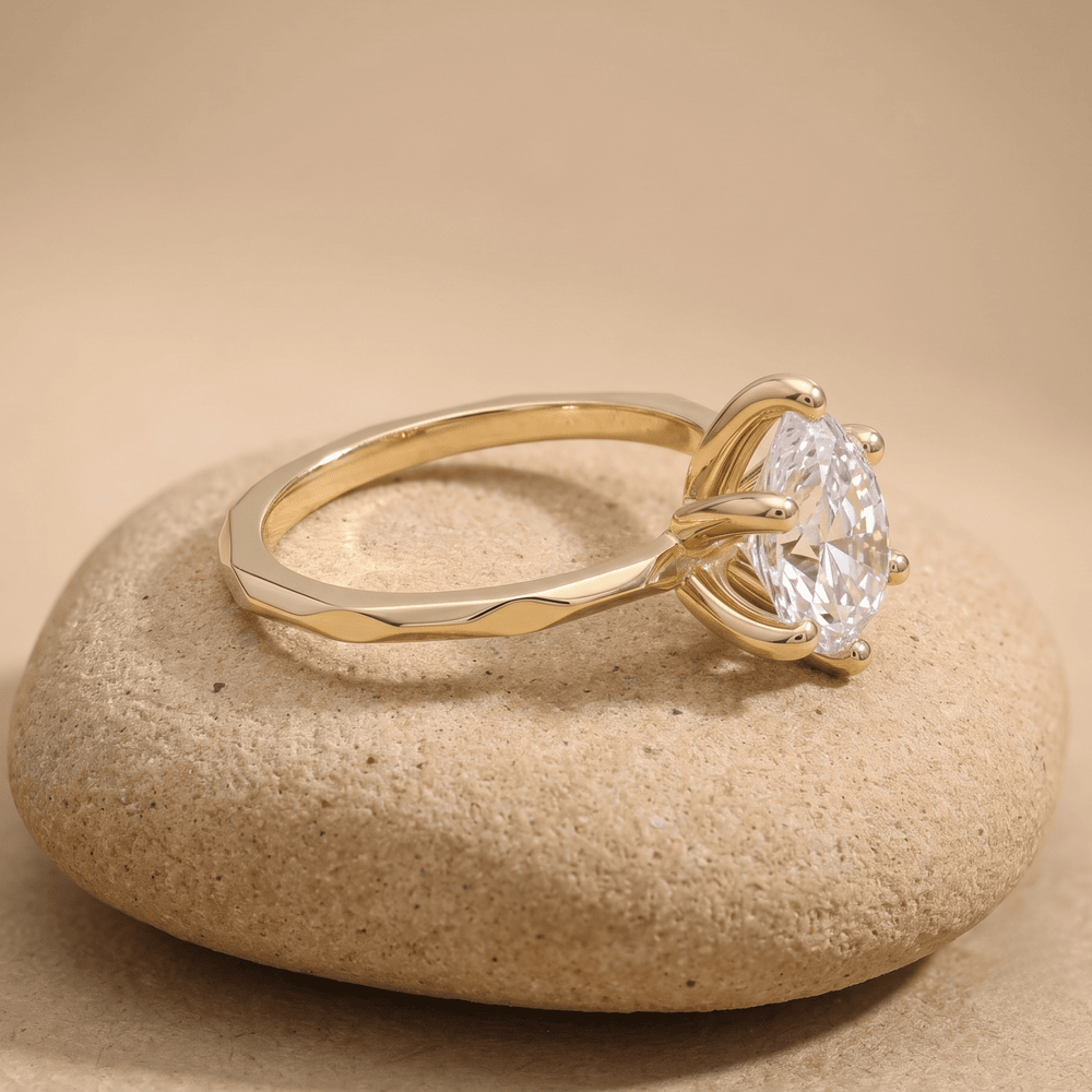 Vintage pear cut solitaire ring side angle