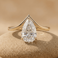 Pear solitaire lab grown diamond curved wedding ring in 10K gold