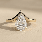 Pear cut lab grown diamond curved band wedding ring