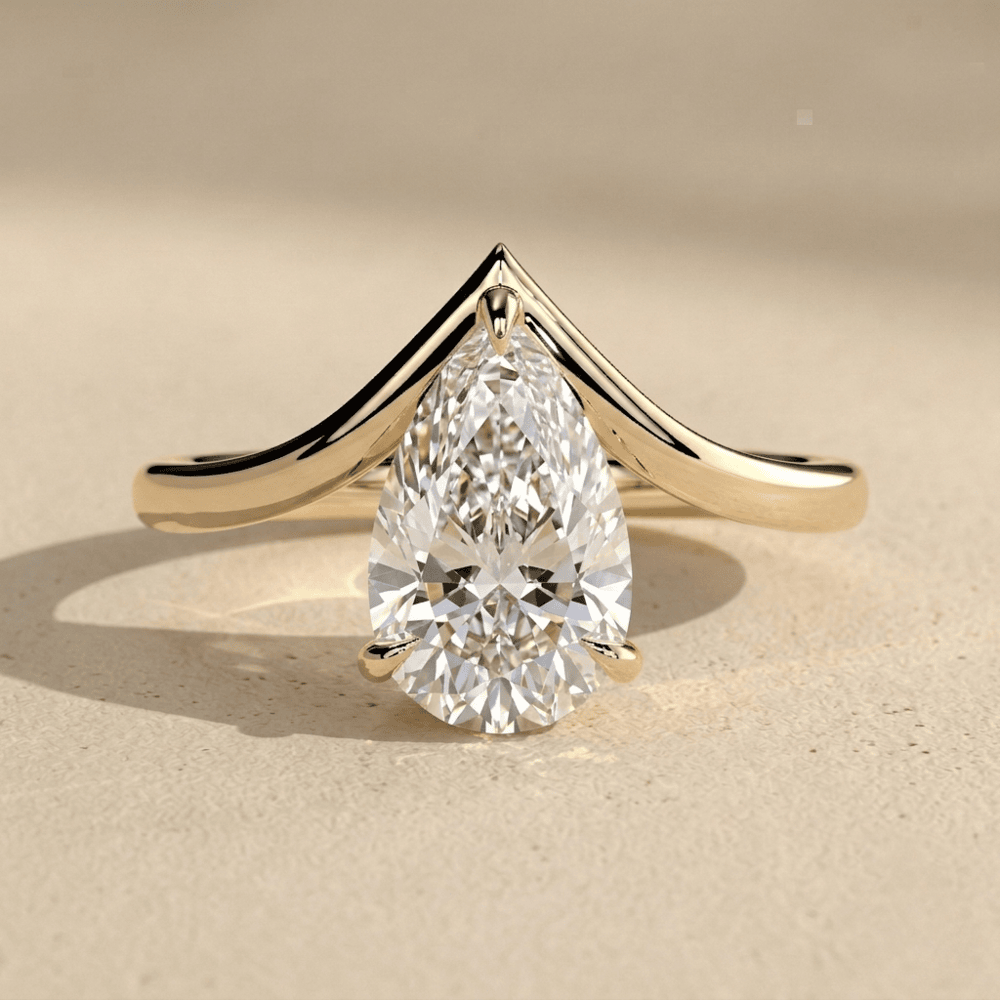 Pear cut lab grown diamond curved band wedding ring