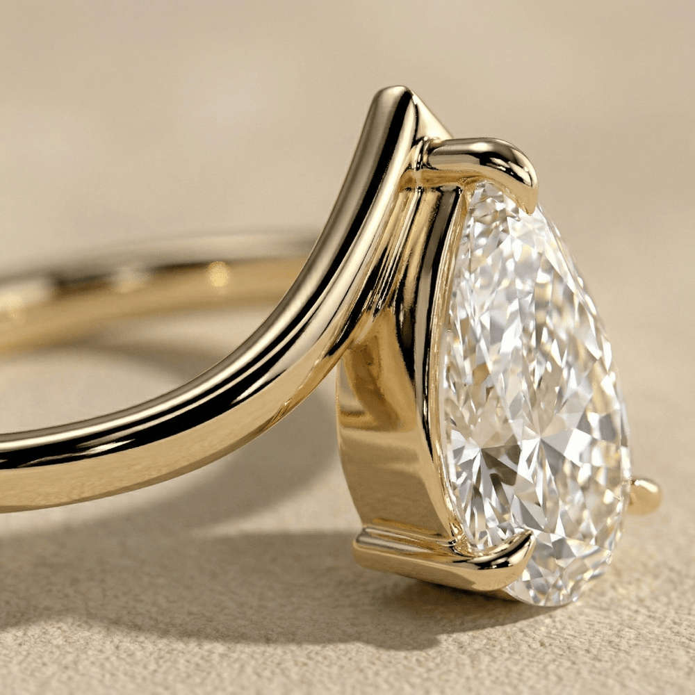 Curved wedding band with pear solitaire lab grown diamond side view