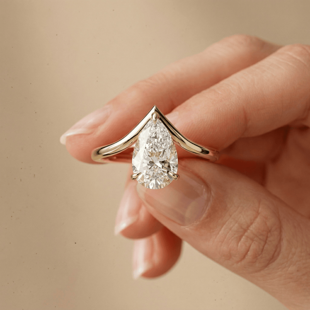 Solid 10K gold pear diamond engagement ring for women hand