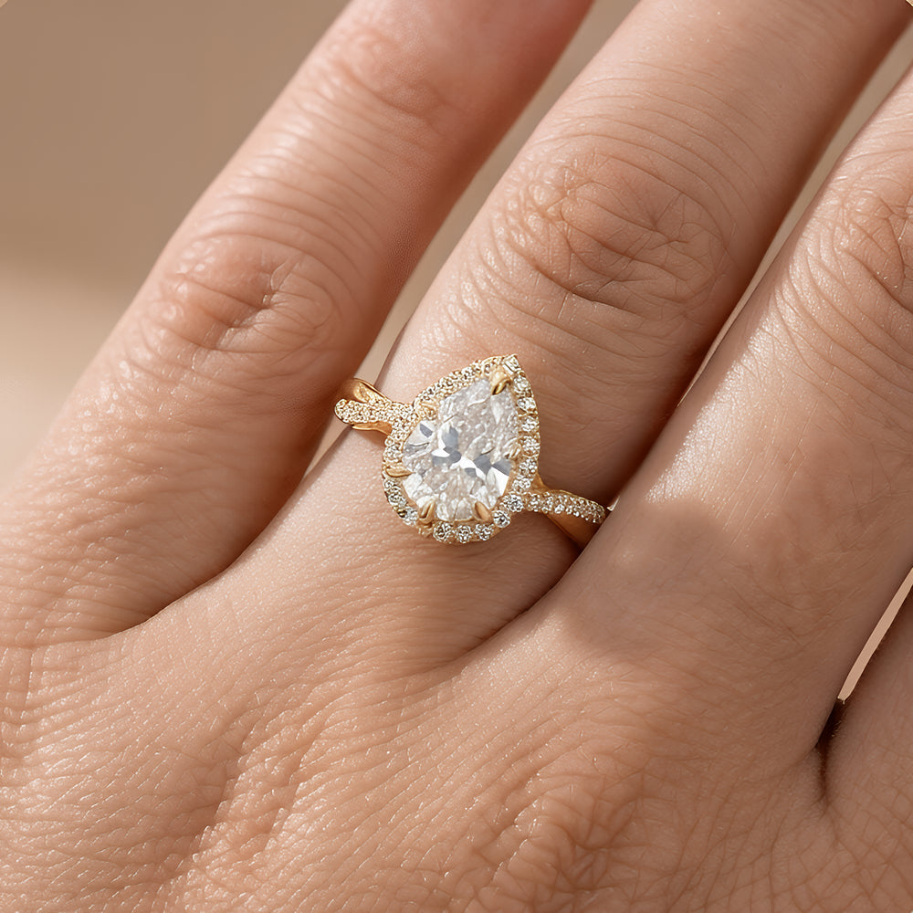 Pear Cut Moissanite Ring with Delicate Twisted Halo