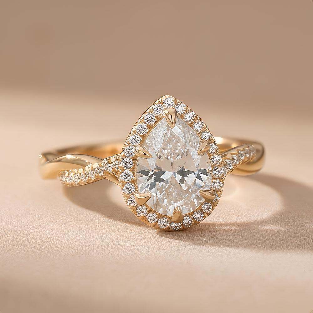 Petite Twisted Halo Pear-Cut Moissanite Engagement Ring
