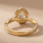 Pear Moissanite Ring Twisted Halo Design