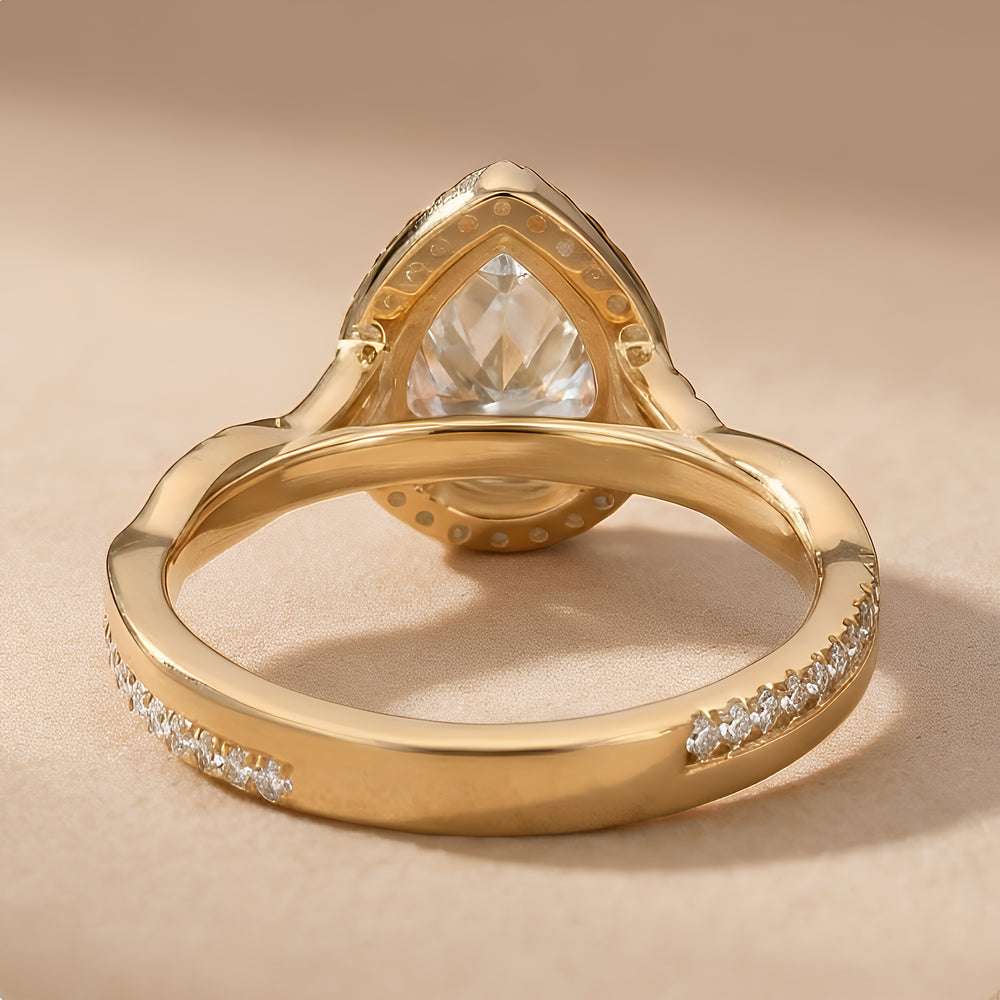 Pear Moissanite Ring Twisted Halo Design