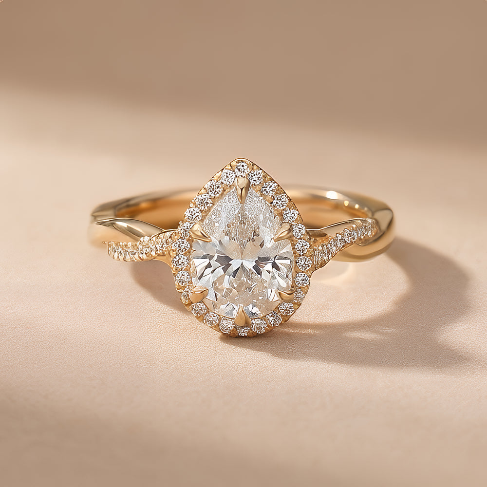Pear Shape Lab Grown Diamond Ring with Twisted Halo Setting