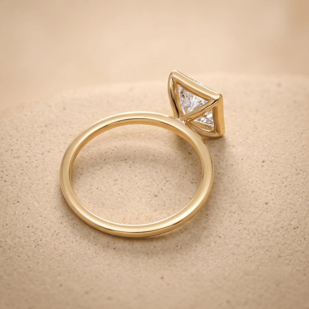 Princess diamond bezel ring for wedding side profile