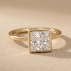 Princess diamond bezel ring for wedding side profile
