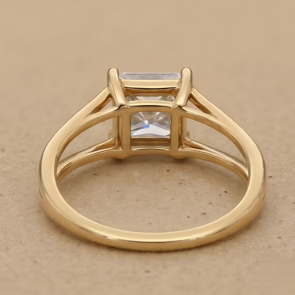 Princess split shank engagement ring worn on hand