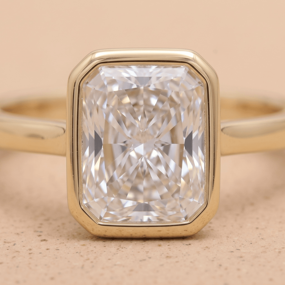 Close-up of bezel setting on radiant cut moissanite diamond