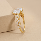 Radiant diamond engagement ring with floral setting