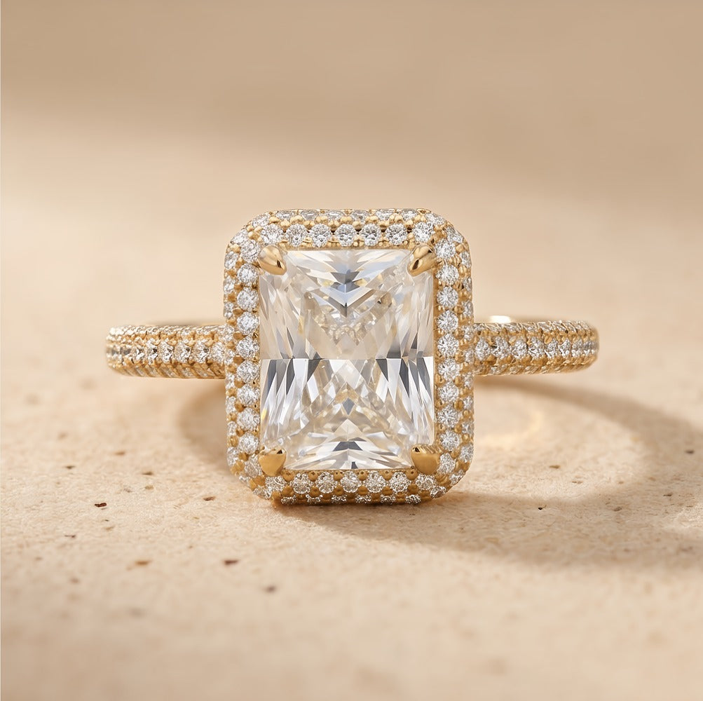 Radiant halo ring top-down view on model finger