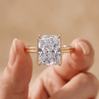 Radiant moissanite ring cathedral setting on hand