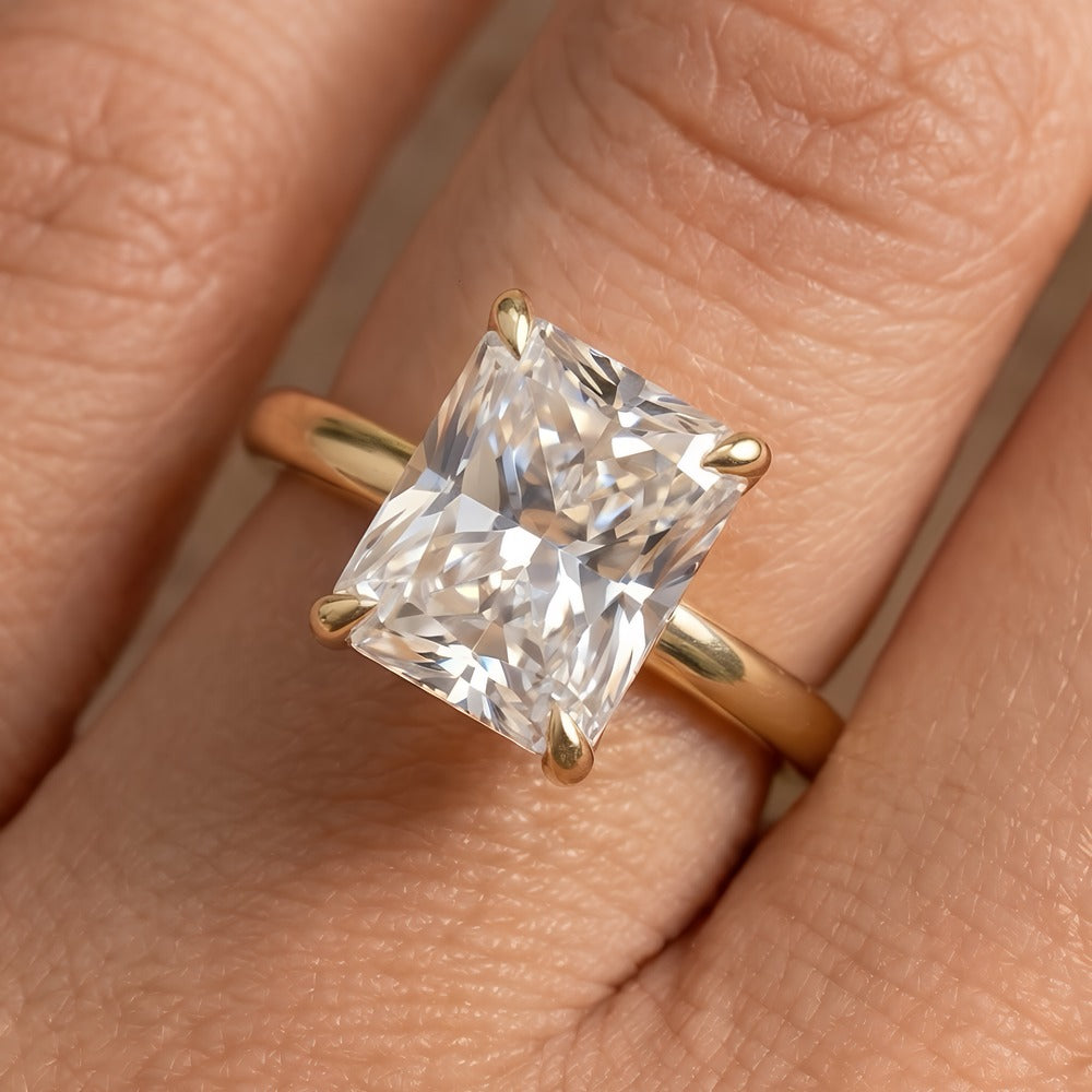 Petal radiant moissanite ring on model's hand