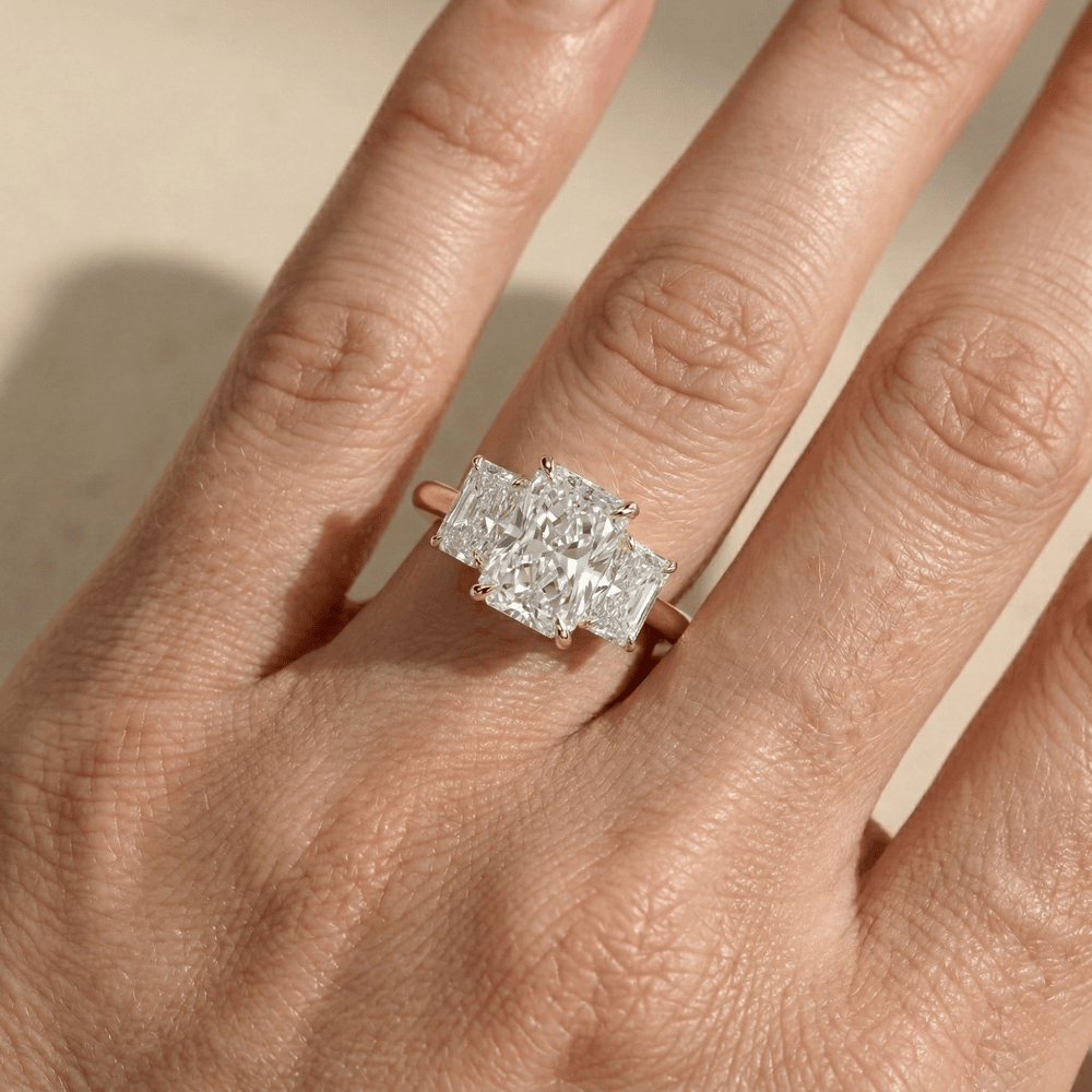 Yellow gold radiant three stone diamond bridal ring