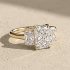 Radiant cut lab diamond engagement ring with side stones