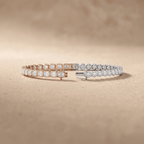 Emerald and round diamond gold bracelet