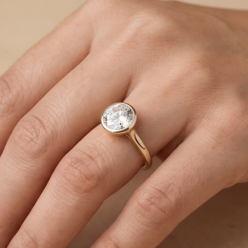 Ethically sourced moissanite bezel solitaire ring