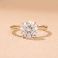 Round cut moissanite ring 14K Petal design front view