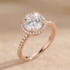 Round moissanite solitaire ring with halo