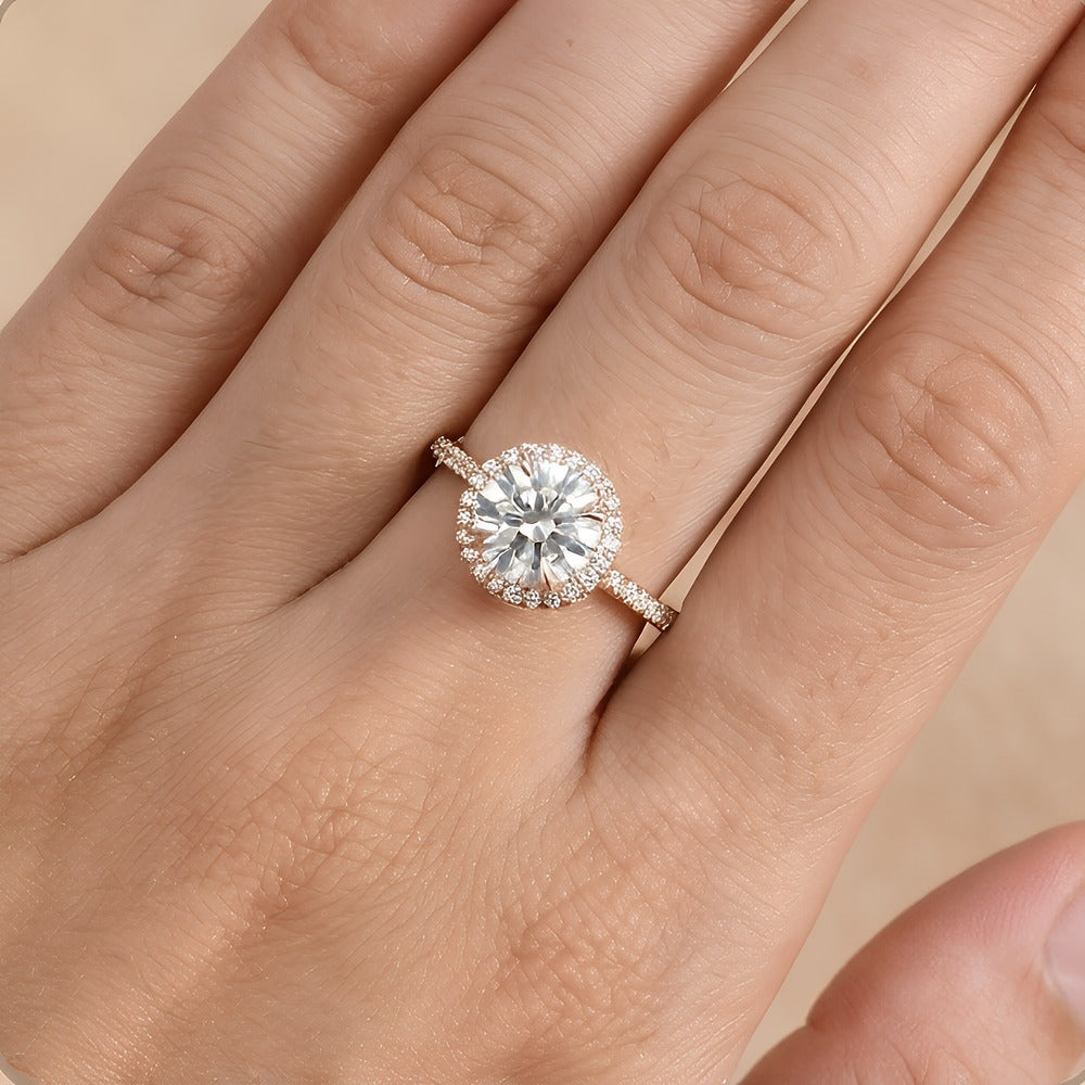 Moissanite engagement ring on hand