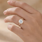 Moissanite engagement ring on hand