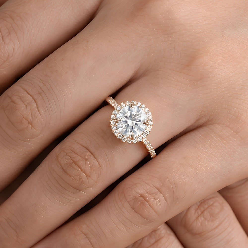 Moissanite engagement ring on hand