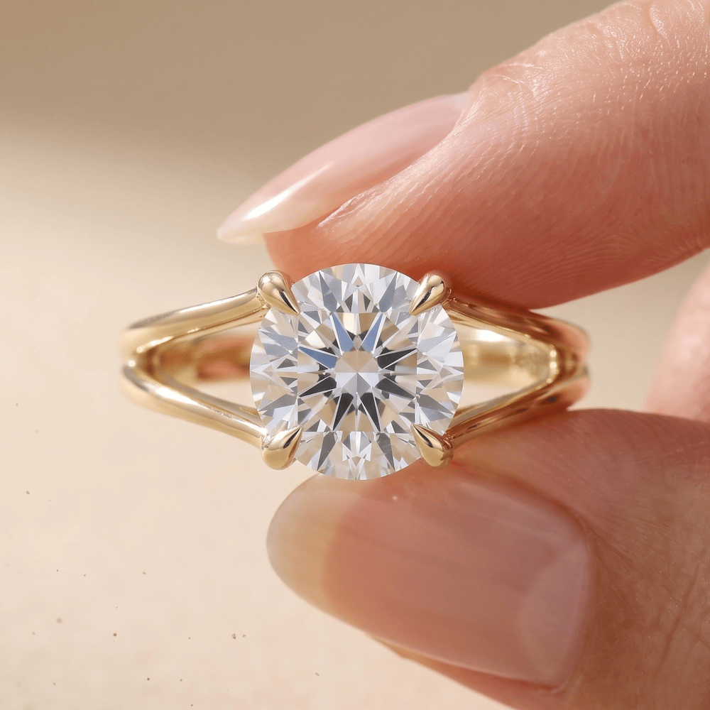Round cut moissanite wedding ring on model's hand