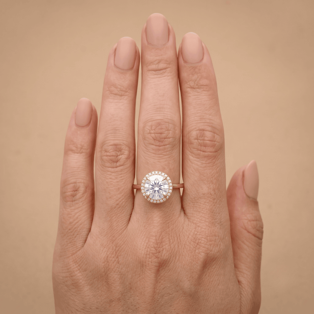 Round halo ring shown on model's hand