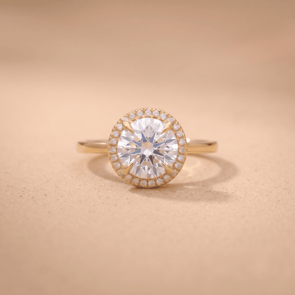 Round cut diamond halo ring on 14K gold band