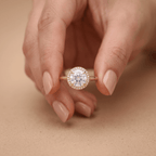 Round halo ring shown on model's hand
