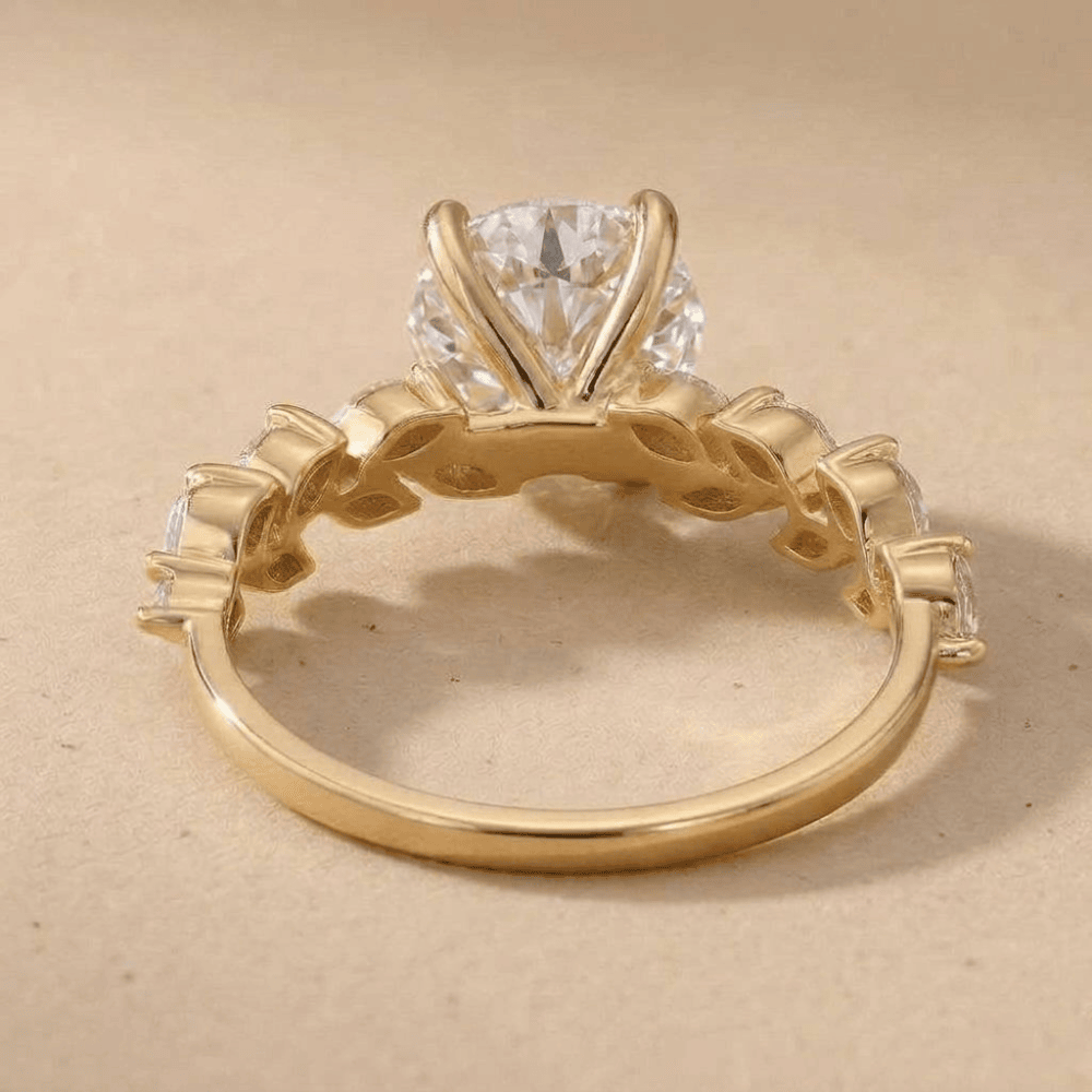 Round lab diamond ring with delicate marquise accents