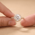 14K gold wedding ring worn on hand, halo design