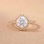 Sunburst round cut lab diamond halo engagement ring front view
