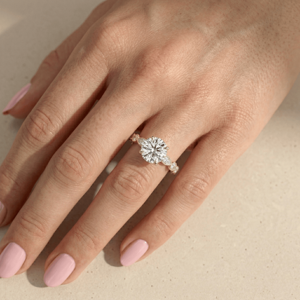 Elegant round diamond engagement ring in solid yellow gold